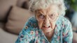 © Adriana - Angry belligerent senior woman looking at the camera