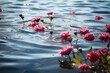 A group of pink flowers drifting on a water surface. Generative AI