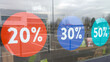Sales in shop stickers windows 20 30 50 percent off promotion in clothing store