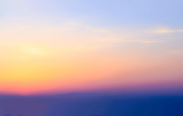 Wall Mural - blue blurry soft panorama sunset sky background with red pink sun light clouds