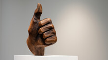 Sculpture Of The Hand Made Of Wood Shows A Thumb Up. The Hand Shows Like In The Museum. Modern Art Object
