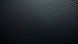 Luxurious black leather texture background with elegant captions and subtle lighting