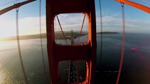 Transport Drive By Golden Gate Bridge At Evening During Sunset.
