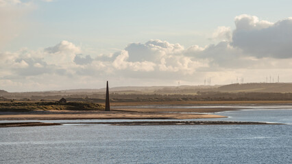 Wall Mural - Stunning dramatic landscape image of Lindisfarne, Holy Island in Northumberland England during Winter