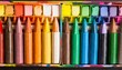 © Paris - box of crayons in a rainbow of colors background
