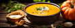 Pumpkin cream soup with black pepper and fresh parsley
