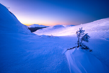 Wall Mural - Winter sunset in the mountains. The Mount Tarnica, Bieszczady National Park, Poland.