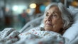 Senior female patient lying on bed in hospital