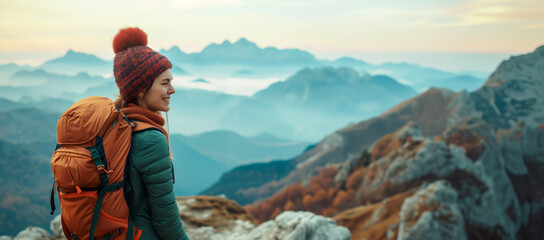 mountain trail joy. smiling woman with backpack hiking in mountains.