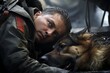police dog handler, kinilog hugs a wounded German shepherd