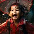 Portrait of a laughing happy asian girl with a umbrella.