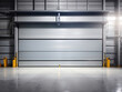 Roller door or roller shutter, concrete floor in the industrial building i.e. modern factory, plant, warehouse, shop, garage or store. Include lighting at night. Nobody and space for background.