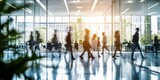 Fototapeta  - Businesspeople walking at modern office. Concept work process. Business workplace with people in walking in blurred motion in modern office space.