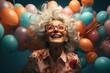 A beaming woman, adorned with glasses and a colorful bouquet of balloons, radiates joy and exuberance as she prepares for a festive celebration