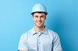 © Neuro architect - A man in a white construction helmet and work shirt on a blue background. Concept: specialist or engineer, advertising construction services, labor protection or vocational training. Banner with copy