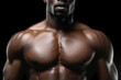 A black male model with hulking muscular upper body posing during a photoshoot. A bodybuilder with bare chest showing off his fit chiseled physique. A masculine African man with bulging muscles.