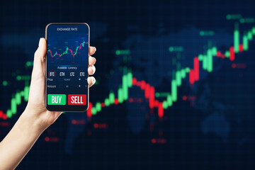 Poster - Close up of businesswoman hand holding mobile phone with glowing forex chart on dark background. Trade, stock and finance concept.