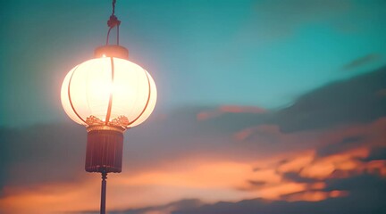 Poster - a chinese lantern is lit up in the evening sky