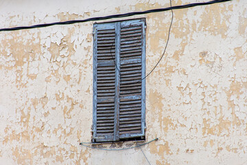 Old window with shutters.