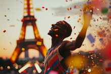 An Athlete Celebrating Winning A Sports Event. Confetti Falling And Paris Eiffel Tower In Background