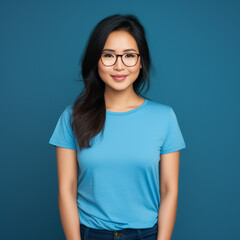 Attractive asian woman isolated on blue background