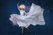 A ballet dancer leaping with grace, adorned in a long white dress and a delicate flower crown. Perfect for conveying elegance, beauty, and the joy of dance
