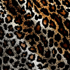 Leopard background texture with gold spots