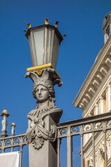 Detail of an ornamental lamppost in Madrid, Spain.