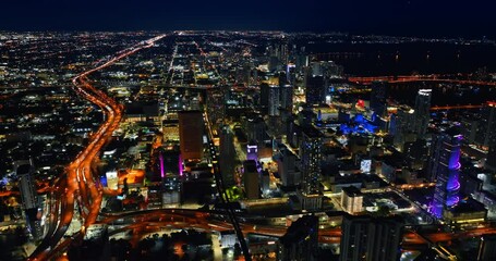 Wall Mural - Panorama of a vibrant metropolis at night. Splendid view of Miami, Florida, USA from top.