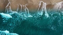 Aerial Drone Top Down View Of Sea Waves Break On Sand. Beautiful Of Sea Water Wave Come To Beach