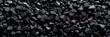 Coal Piled High, the Black Energy-Rich Mineral Used as a Fossil Fuel in Industry