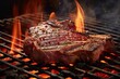  a steak roasting on a grill with flames coming out of it's back and on it's side.