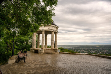 Wall Mural - Rotunda Aeolian Harp in Pyatigorsk, Stavropol Krai, Russia. It is landmark of city installed in 1831. Old arbor on Mashuk mount in Caucasian Mountains in summer. Travel, sky, park theme