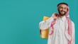 © DC Studio - Happy arab holding shopping bags in studio, feeling cheerful after buying products on discount. Middle eastern person purchasing merchandise on sale at retail store, colorful paper bags.