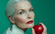 © StellaPattaya - old woman with an apple in her hand, aged woman and young apple, aging skin