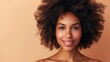 © buraratn - Beauty portrait of african american girl with clean healthy skin on beige background. Smiling dreamy beautiful black woman.Curly hair in afro style