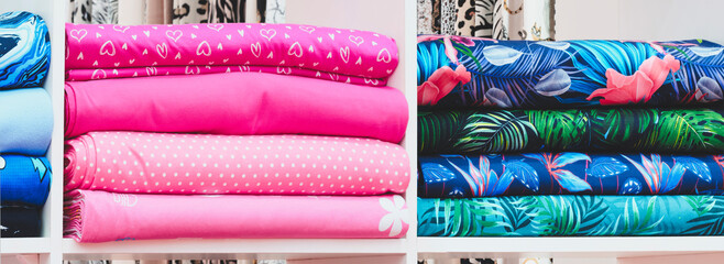 Poster - Multi-colored textiles on the shelves in the market