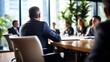 © Babu - A professional in a boardroom, engaged in a business discussion , professional, boardroom, business discussion