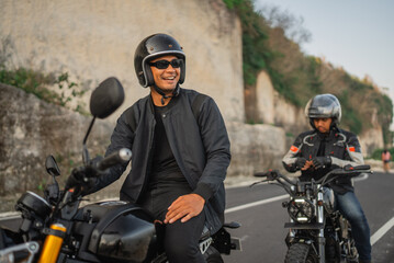 Canvas Print - fun adventure of indonensian riders driving motorbike around countryside