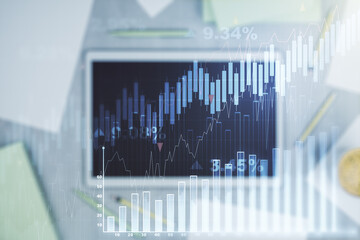 Poster - Multi exposure of abstract financial graph and modern digital tablet on desktop on background, top view, financial and trading concept