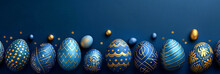A group of Easter eggs with blue and gold decoration on a blue background. Flat lay, top view. religious holiday. Banner, card with place for text. Free copy space