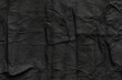 © Nice Seven - Dark black grey paper background creased crumpled surface, Old torn ripped posters scary grunge textures. black friday paper banner