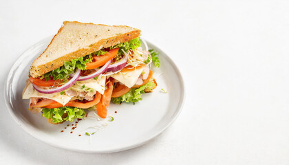 Wall Mural - A perfect club sandwich served on a white plate and isolated against a clean white backgroun