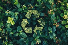 Green Recycling Symbol Amidst A Lush Bed Of Various Green Plants