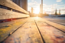 Sunlight Shining On A Weathered Wooden Boardwalk