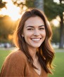 Woman smiling with perfect smile and white teeth in a park 