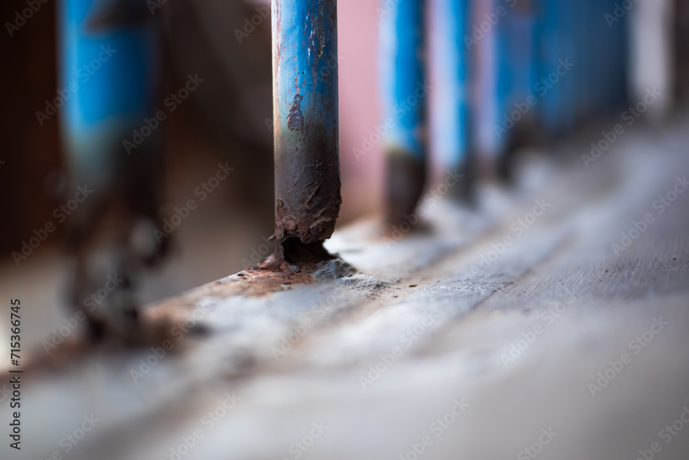 Iron Core Rode Corrosion on iron fence. Rusty metal fence. Steel pipes rust. The old ...