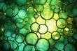  a close up of a bunch of bubbles on a green and yellow background with a blurry light in the background.