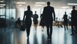 © Anna - business workplace with people in walking in blurred motion in modern office space