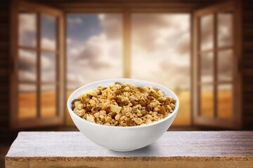 Canvas Print - Dried fruits and tasty nuts on a table.